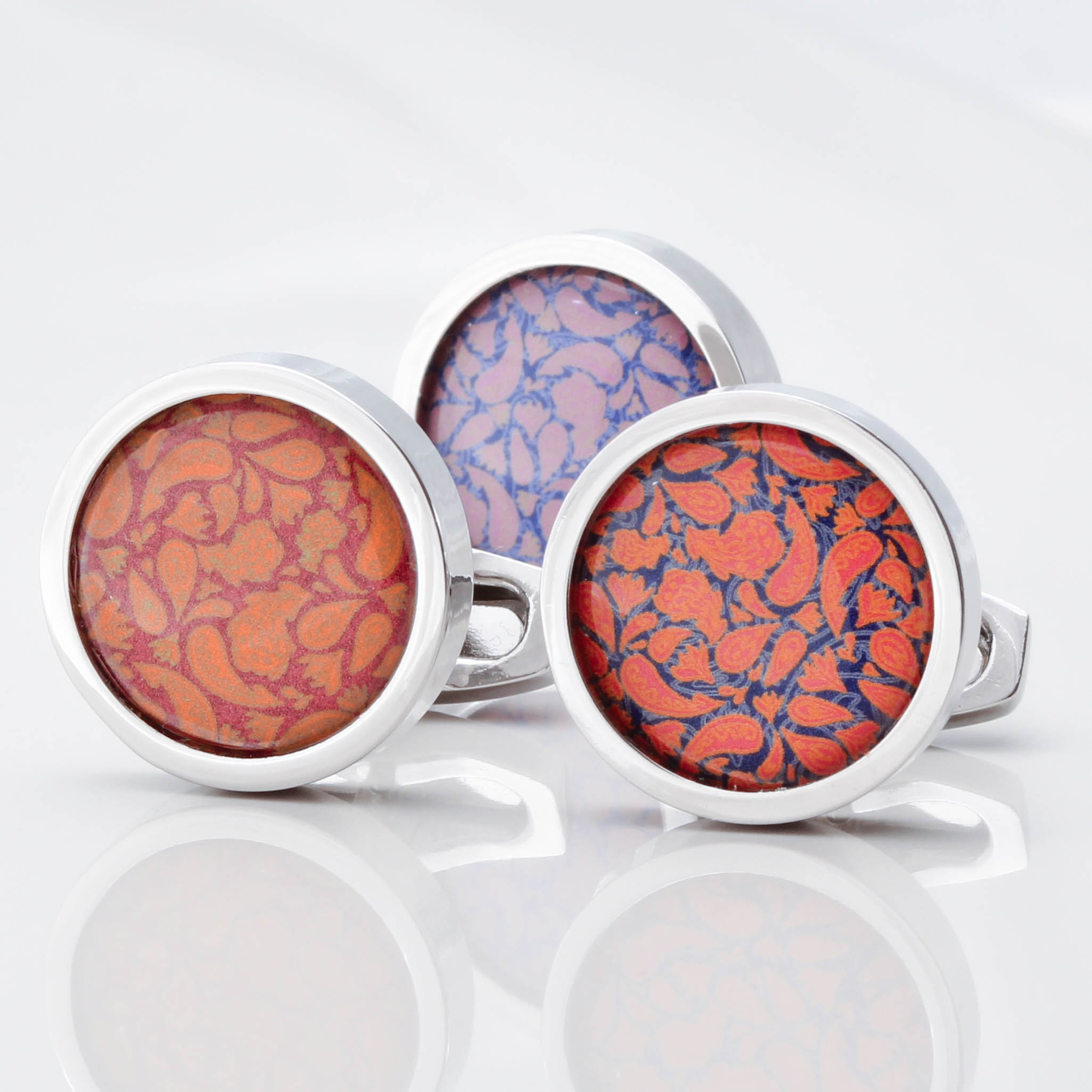 Three sample designs by badger and brown such as mustard design pot, resting embers, and bruised peach