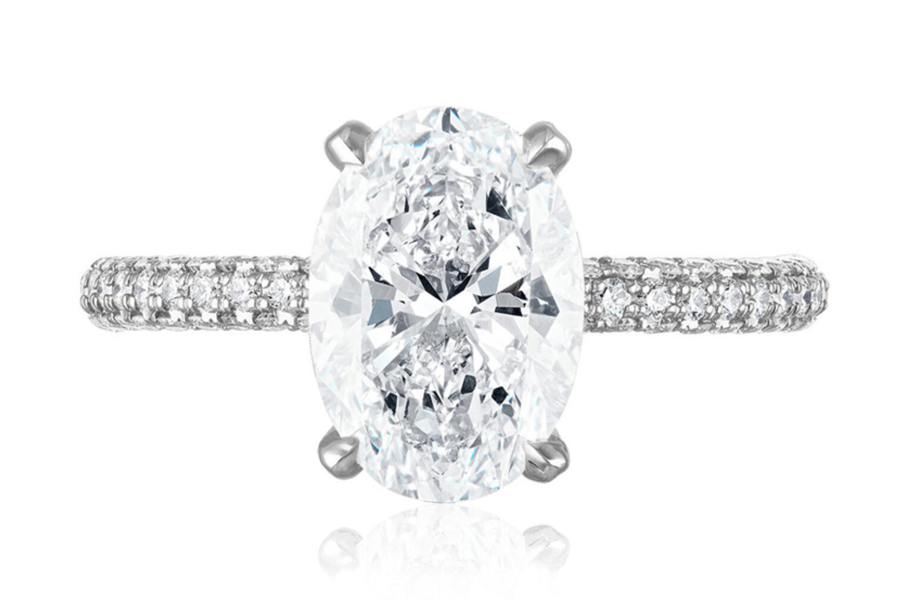 This Stephanie Gottlieb ring, similar to Simone Biles’ engagement ring, features a 2.5-carat G-color SI1 oval-shaped diamond set in the company’s signature platinum three-sided diamond pavé setting