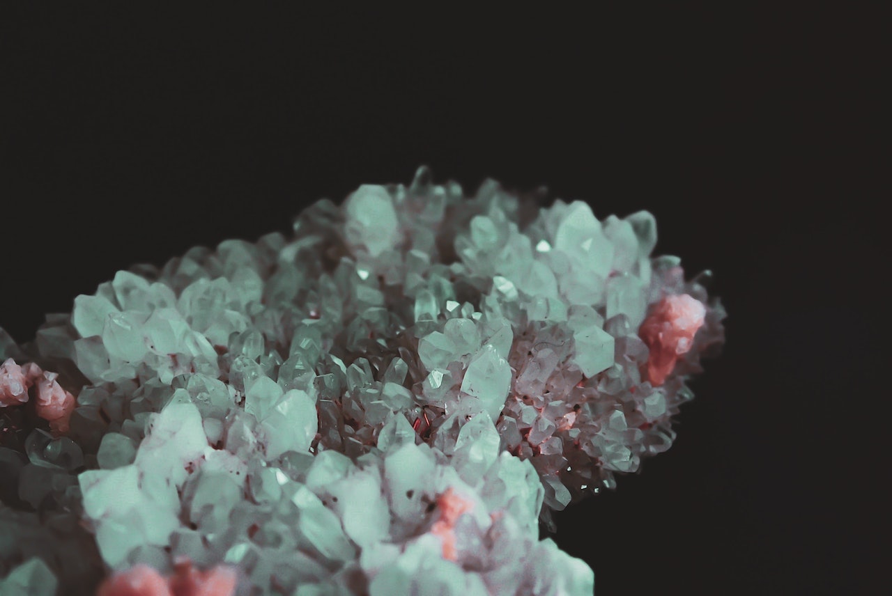 Piece of crystal rock in darkness