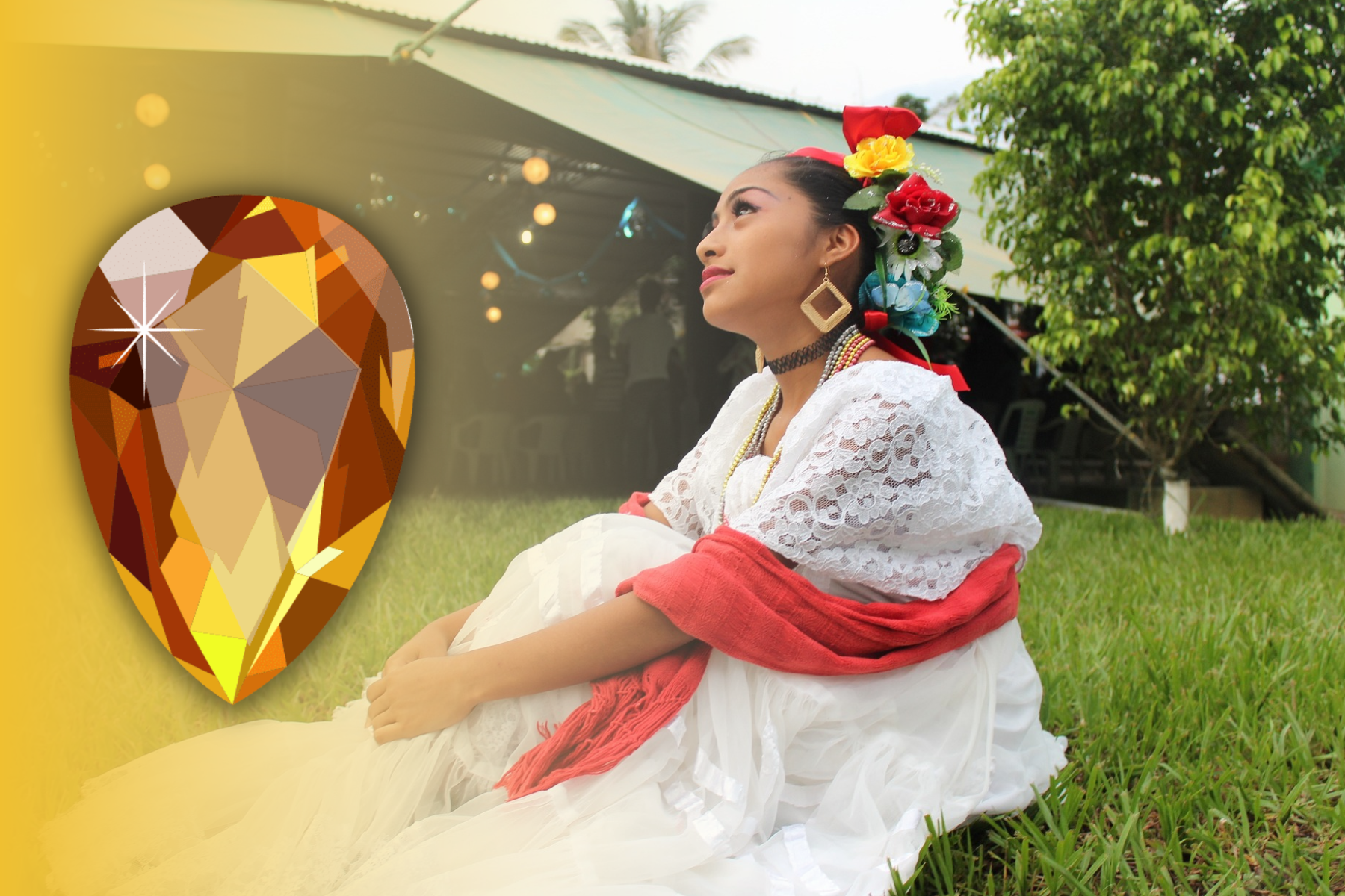 A photo of a woman seated on a patch of grass, adorned with eco-friendly jewelry. She is positioned beside a bright yellow gemstone