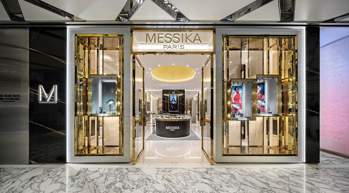 Modern Repossi jewelry boutique interior with marble finishes