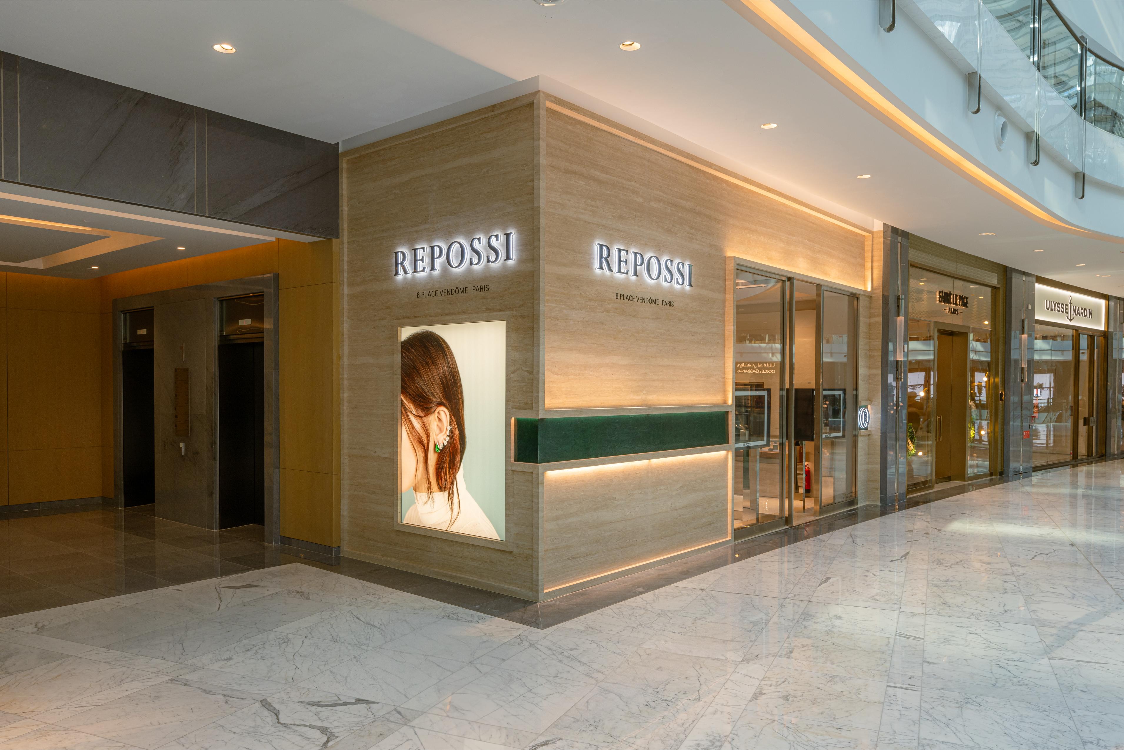 Modern Repossi jewelry boutique interior with marble finishes
